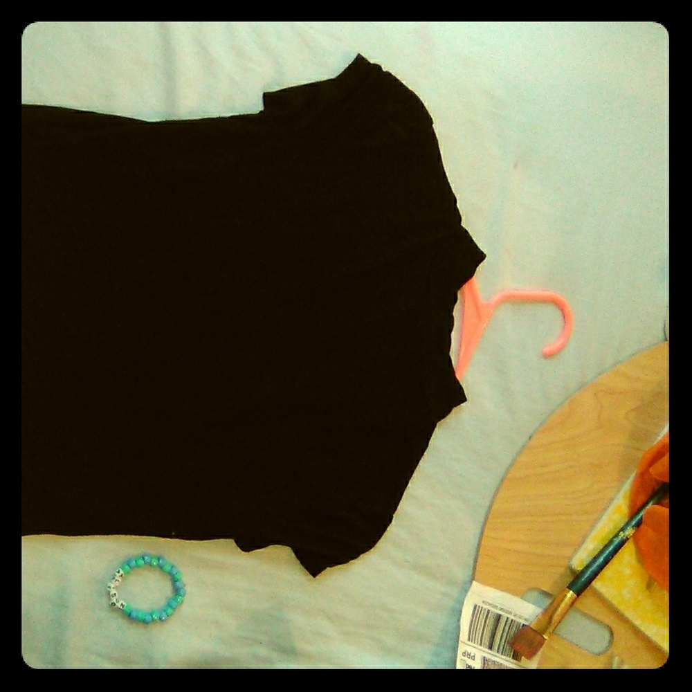 A black turtleneck crop top